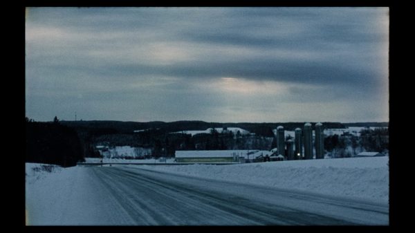 Sweet Captive film image; a deserted snowy road