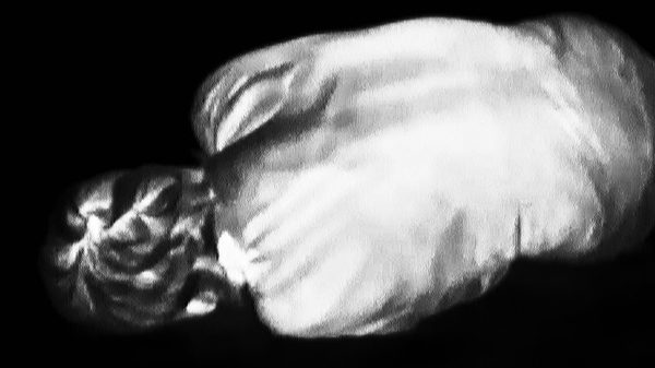 This Is an Autopsy film image; a body curled in on itself
