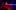 Turtle Island Rap film image; woman singing into a microphone