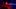 Turtle Island Rap film image; woman singing into a microphone