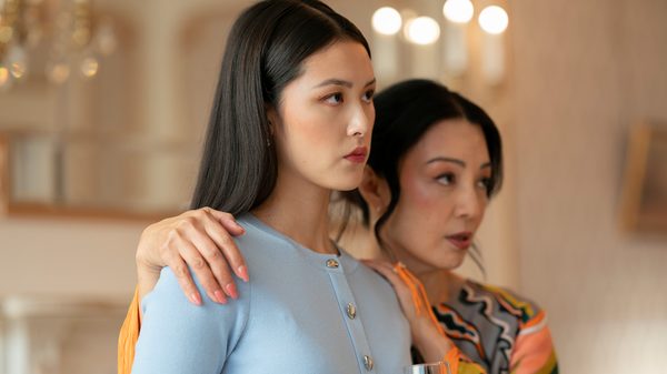 Whatcha Want film image; two women staring at something offscreen