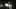 The Exorcist film image; silhouetted figure standing outside a house at night