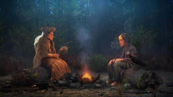 Haboolm Ksinaalgat (Soul Catcher) film image; two people sitting by a campfire