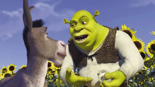Shrek film image; ogre talking to a donkey in a sunflower field