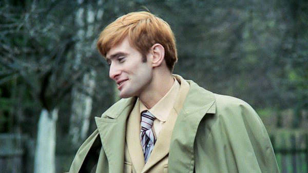 The Birch Wood film image; man in a trench coat