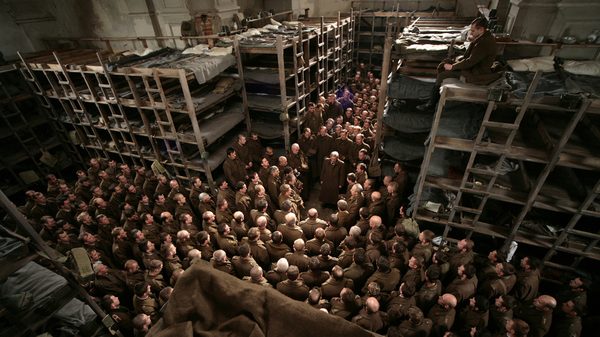 Katyn film image; overhead shot of a crowded prison camp