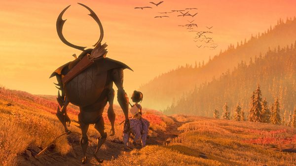 Kubo and the Two Strings film image; large humanoid figure walking behind a child riding an animal
