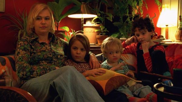 Together film image; family snuggled on a couch
